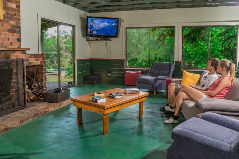 The Kookaburra Room lounge with its brick fireplace